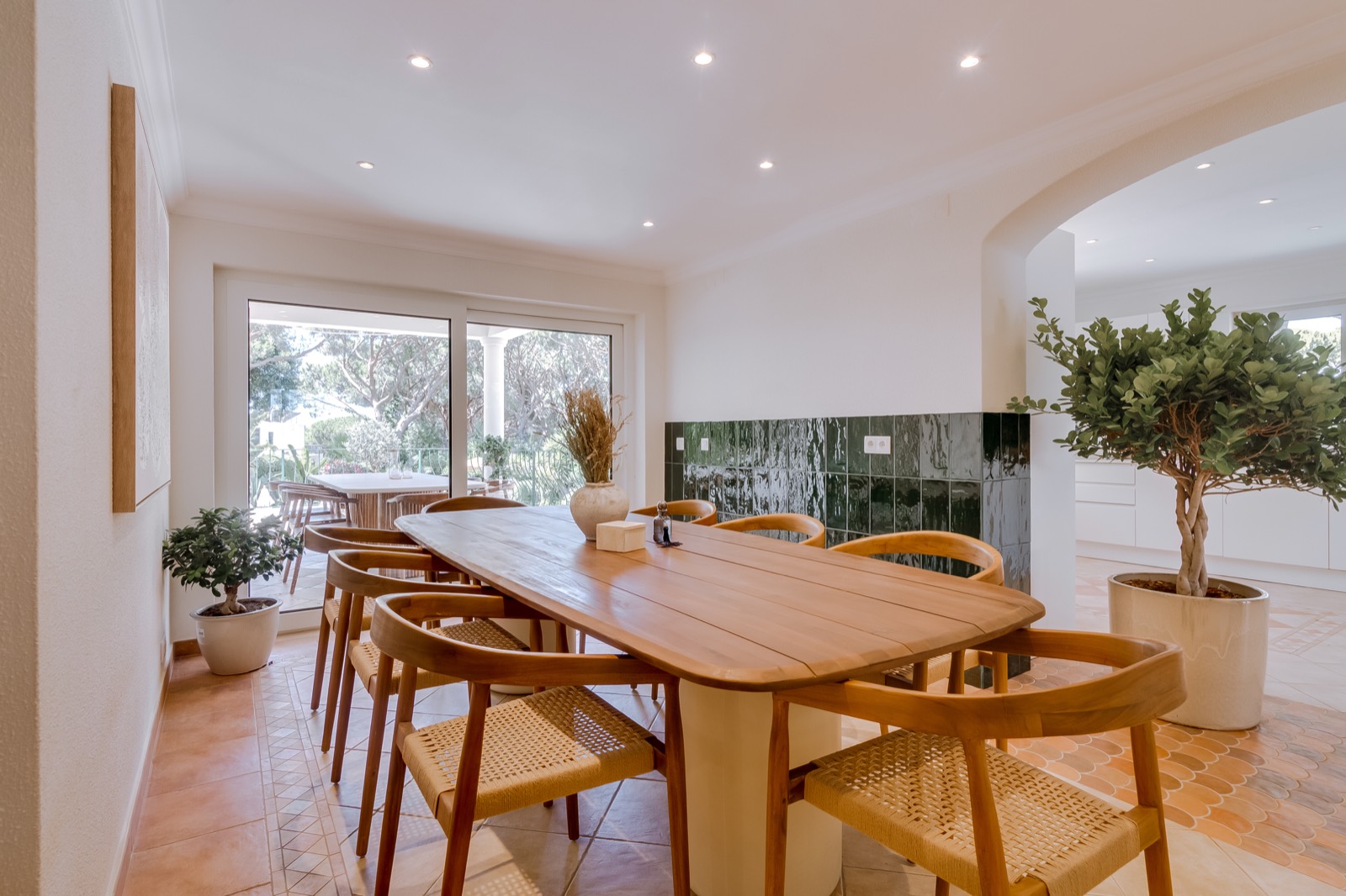 Dining room with a large table and views over the garden