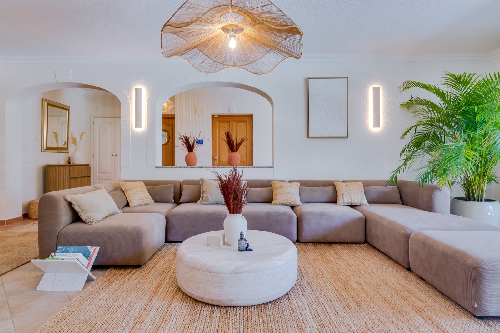 Living room with soft natural textures and garden light
